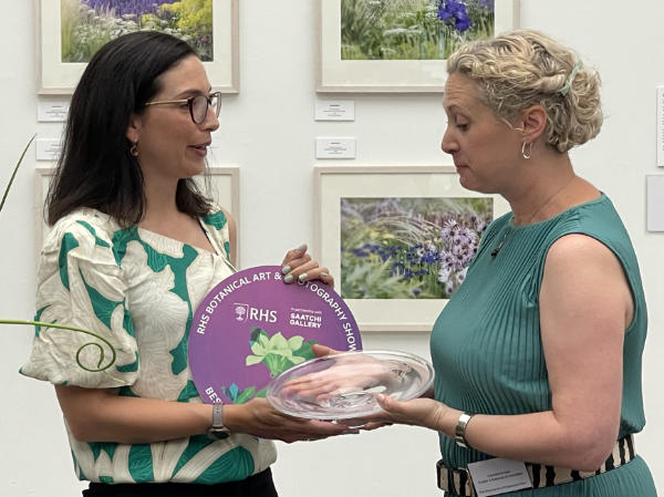 Nina Mayes receiving the RHS Best Botanical Art Exhibit Award 2023